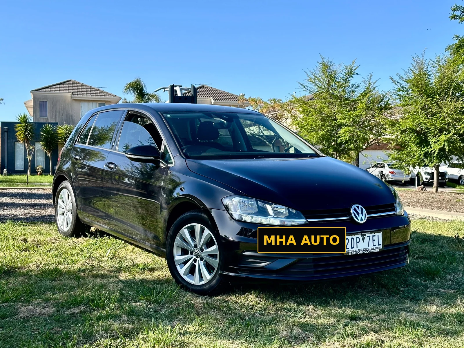 Black hatchback gloss by MHA Auto Detailing
